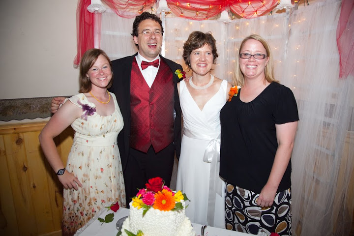 With the cake servers Cheryl and Holly. With the cake servers Cheryl and Holly.